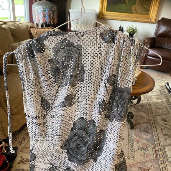 This top will be perfect  for the holidays or a night out on the town. - Picture 2 of 3